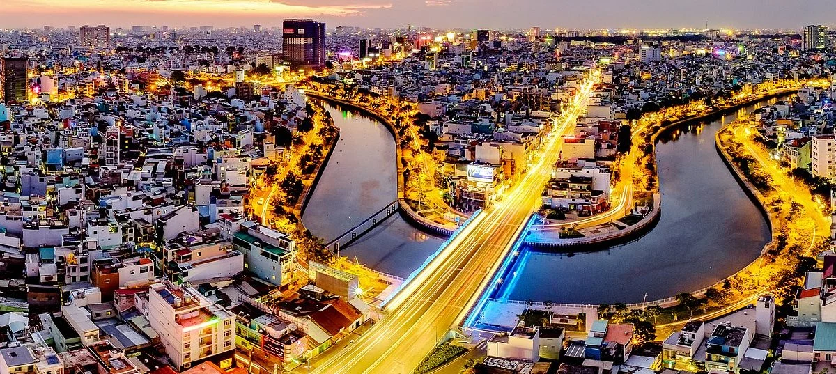 Ho Chi Minh City skyline and river illuminated at night