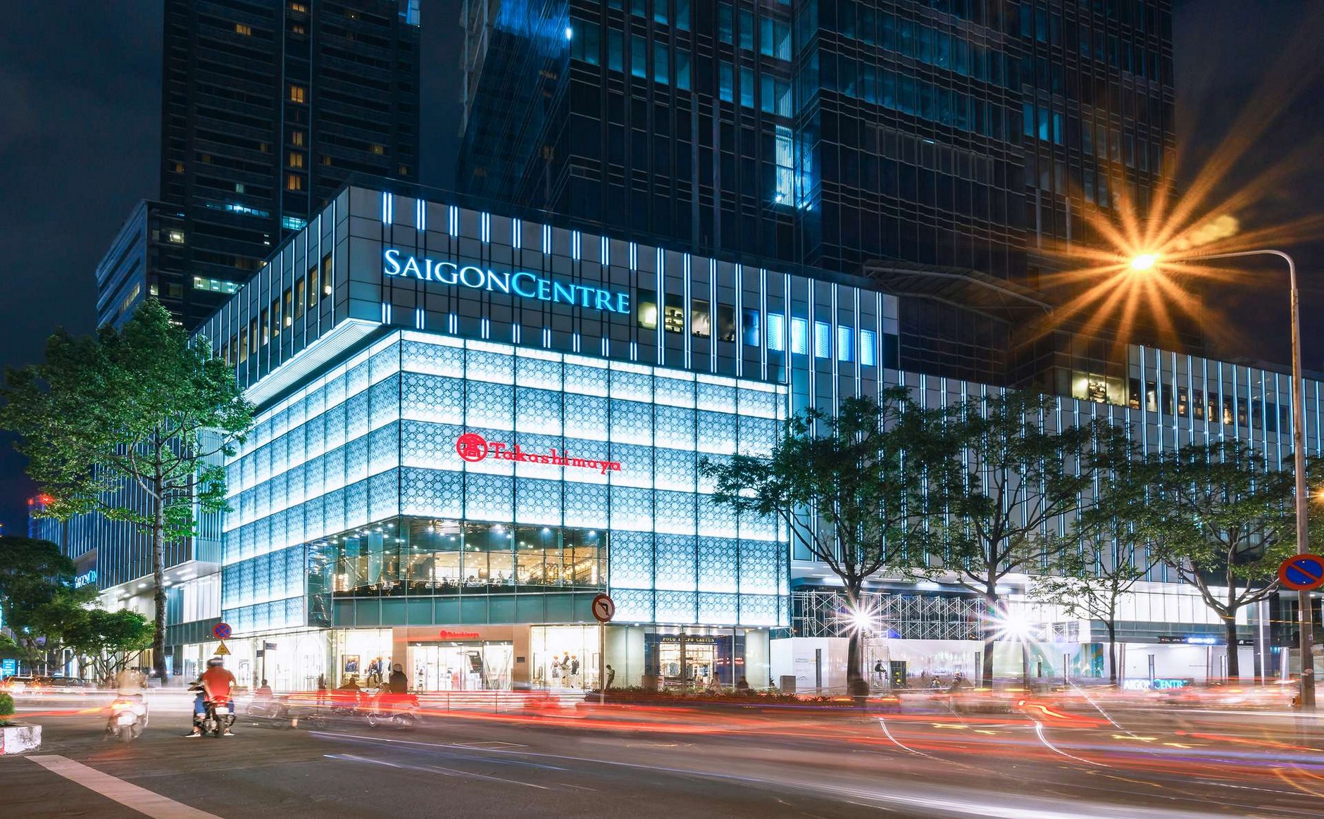 Saigon Centre podium with Takashimaya shopping center on Le Loi Boulevard at night