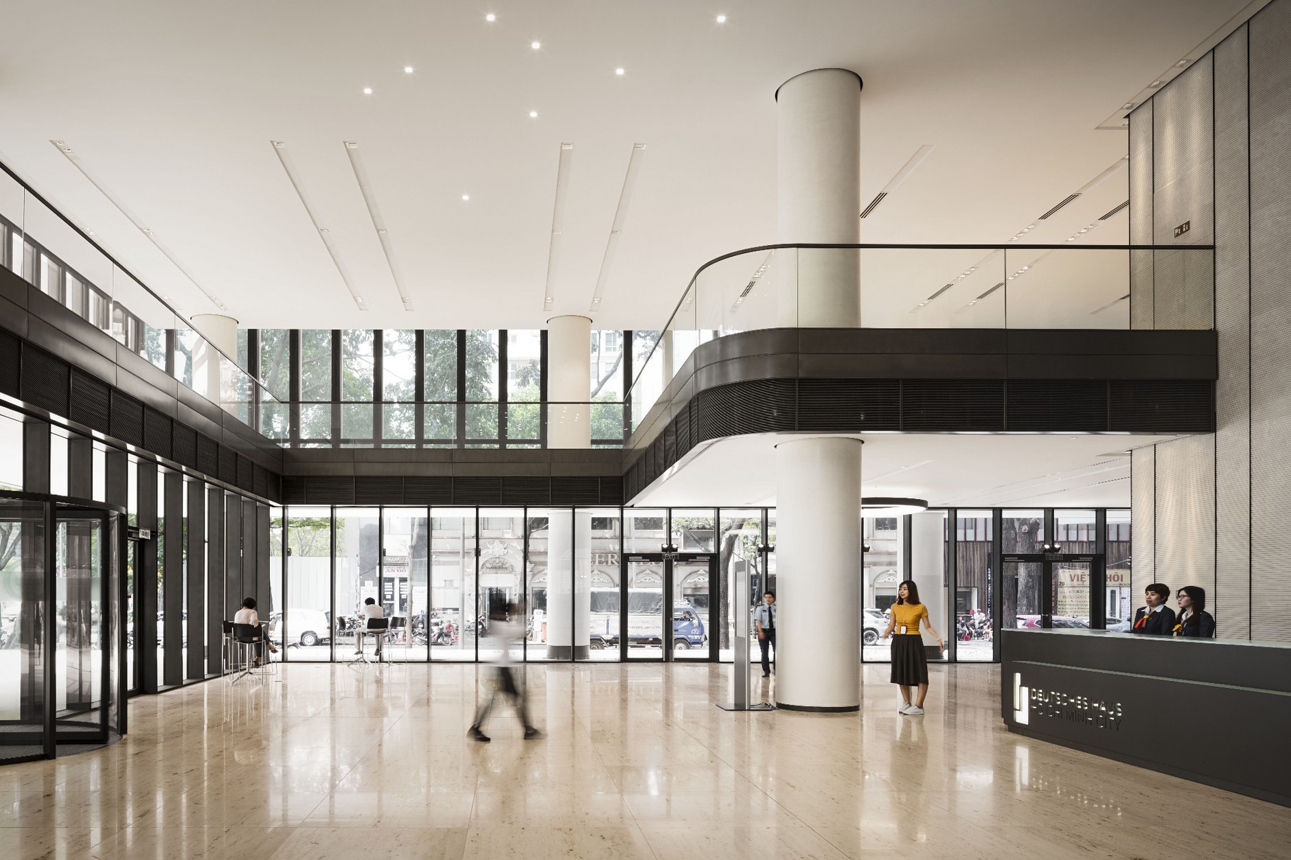 Double-height lobby of Deutsches Haus office building on Le Duan Boulevard, Ho Chi Minh City