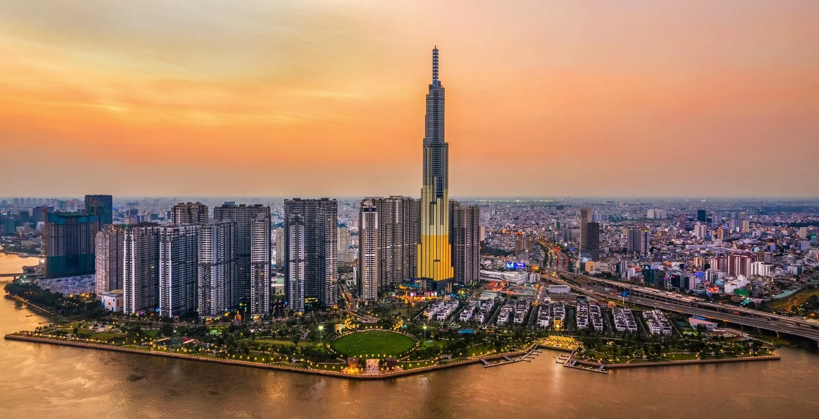 Landmark 81 and the Vinhomes Central Park skyline at sunset